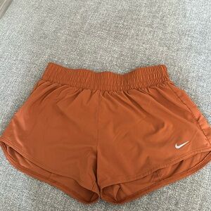 Women’s orange Nike dri fit shorts size medium